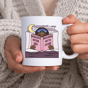 Romance Readers Never Go to Bed Alone Mug